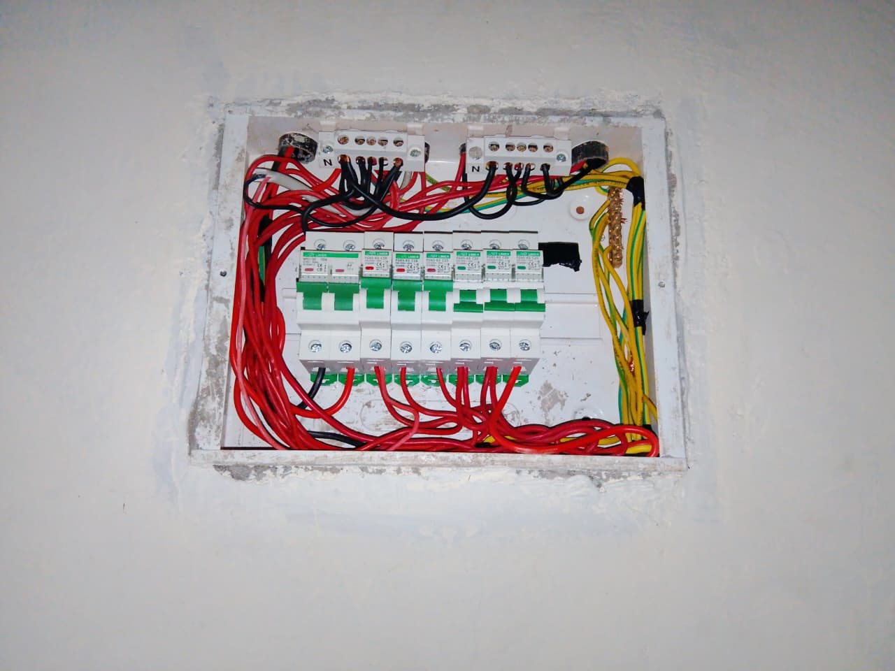 Professional electrician installing house wiring